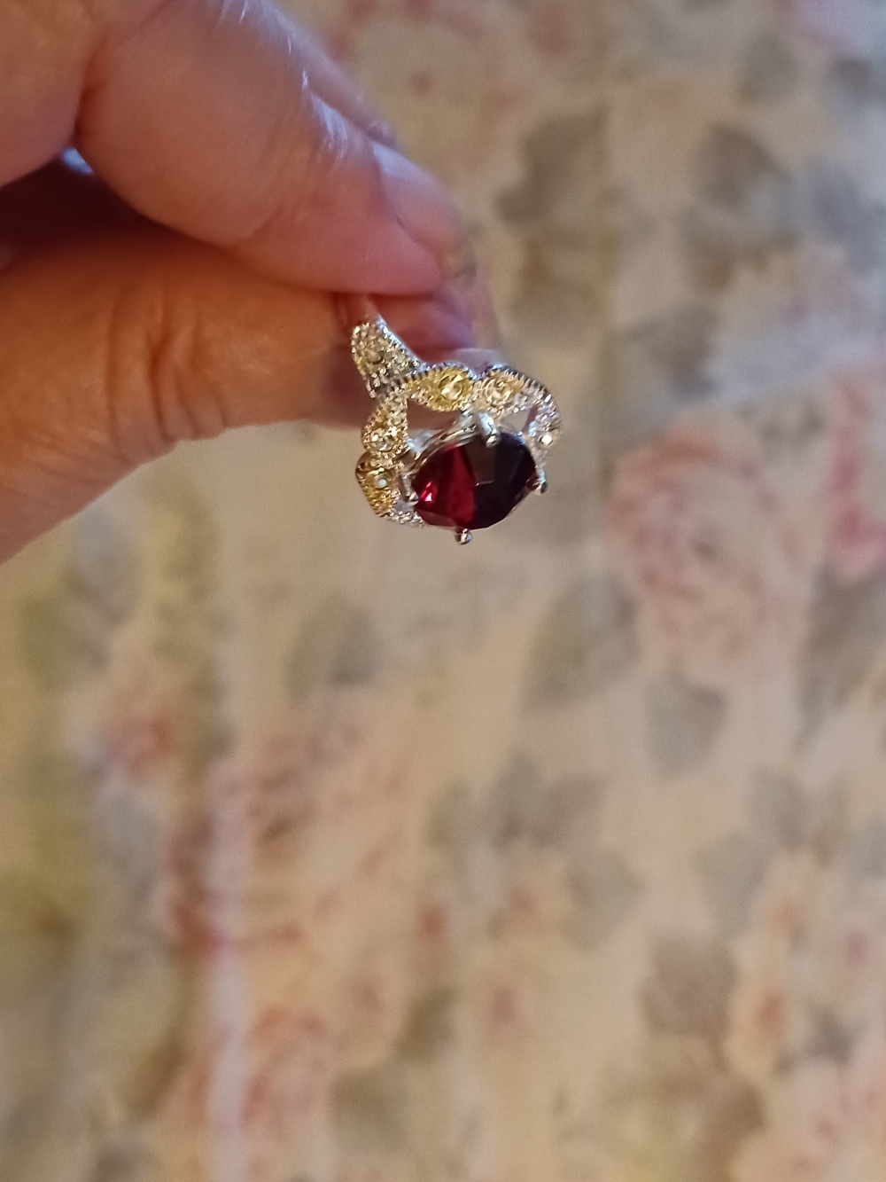 Sterling Silver Ring with Deep Red Oval Stone and Crystal Accents